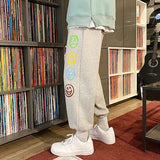 FOESCE Fashion Mens Vintage Washed Hip Hop Smile Face Printed Loose Fit Denim Pants Urban Style Trousers Male Sweatpants